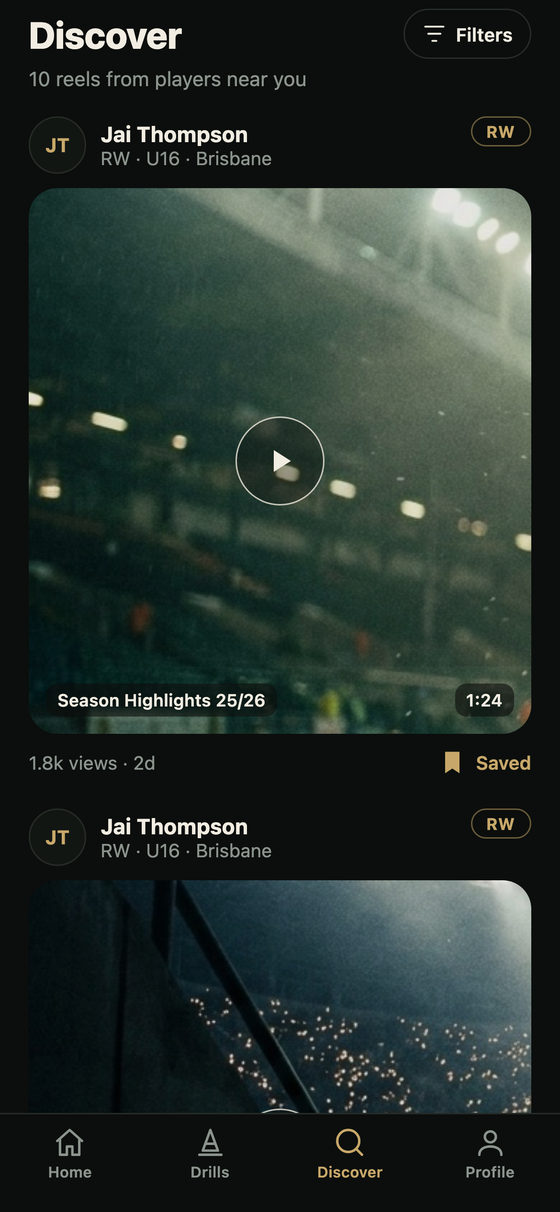 The Discover feed listing reels from players nearby, each card showing the player's name, position, age group and city above a playable highlight video.